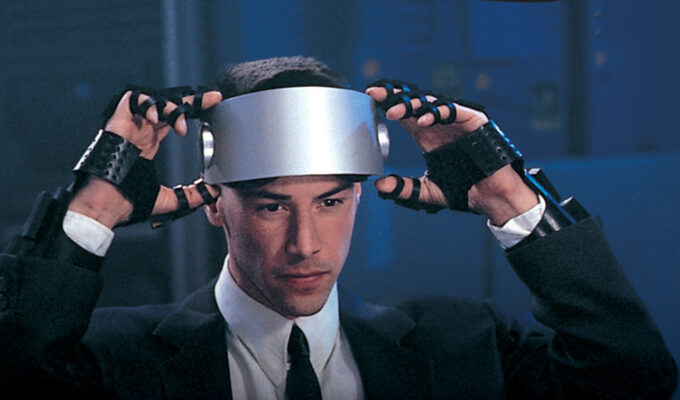 Keanu Reeves with silver goggles in 25th anniversary re-release of 1995 cyberpunk thriller Johnny Mnemonic