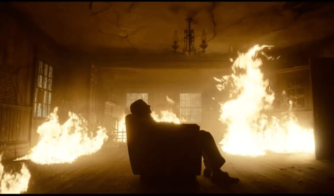 Bradley Cooper sat in burning room in Nightmare Alley