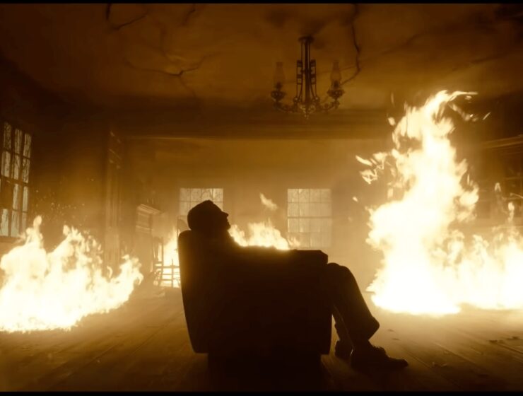 Bradley Cooper sat in burning room in Nightmare Alley
