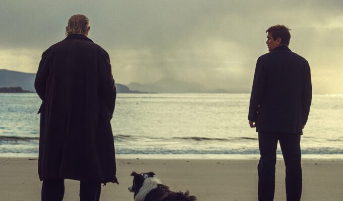 Colin Farrell and Brendan Gleeson on beach looking at sunset in The Banshees of Inisherin