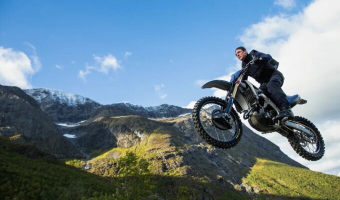 Tom Cruise as Ethan Hunt in motorbike stunt for Mission Impossible Dead Reckoning Part One