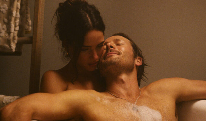 adria arjona and glen powell in richard linklater comedy hit man